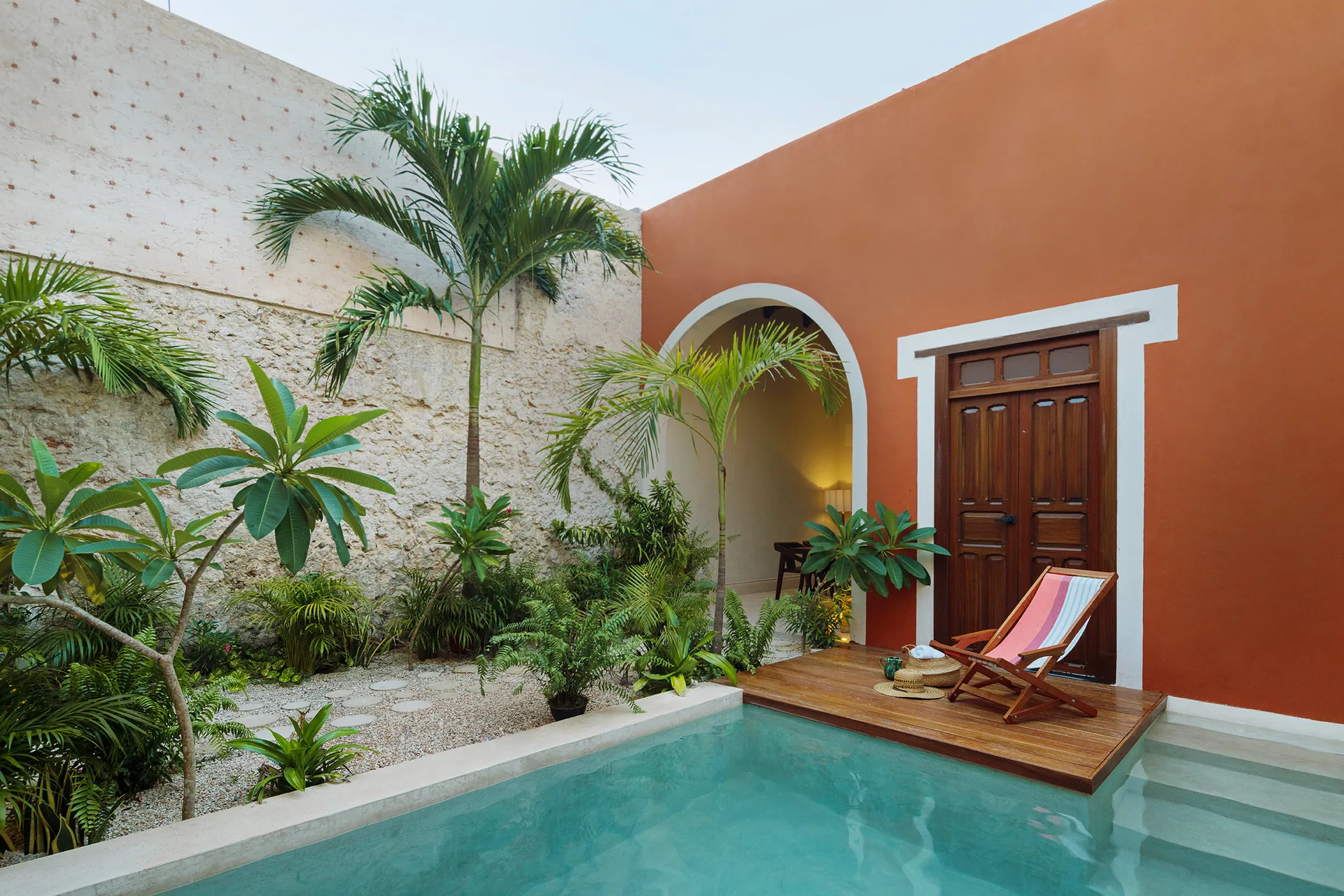 Restored colonial courtyard pool at Casa Ex Templo, an award-winning heritage home in Campeche