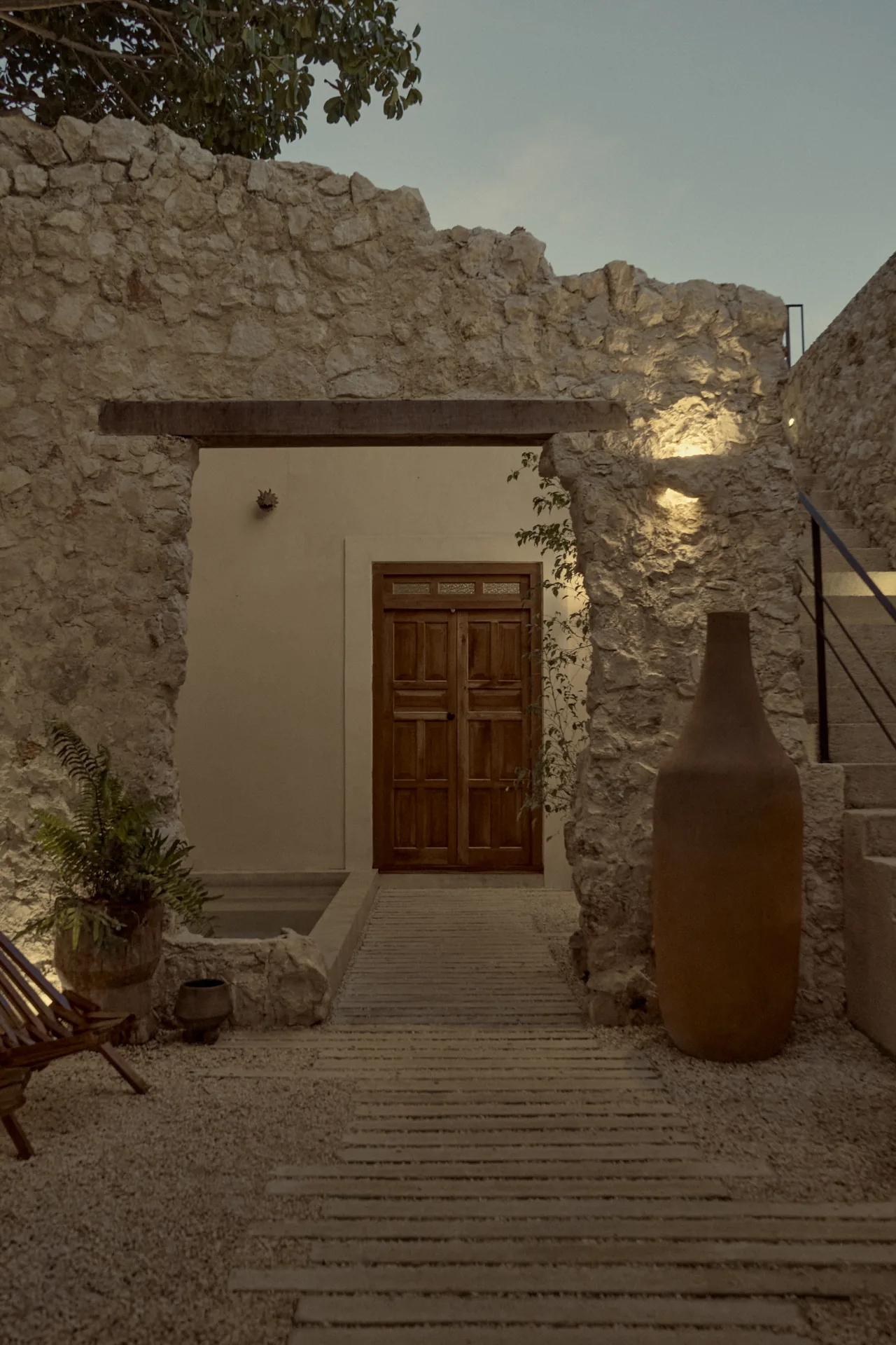 Casa Muralla, restored stone interior courtyard — Campeche colonial architecture — Casonas MX, Campeche